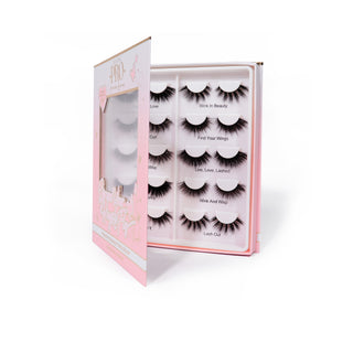 An open package of P.Louise Pro Lash Book containing 10 pairs of false eyelashes displayed in a box with heart designs and decorative elements.