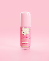 Voir à travers le flacon rose de sérum réparateur de barrière rose P.Louise Better Now Babe au parfum Twilight Tide sur fond rose