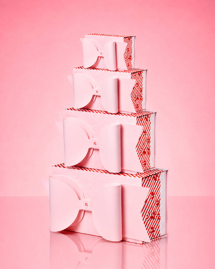 Boîte d'emballage cadeau avec nœud rose