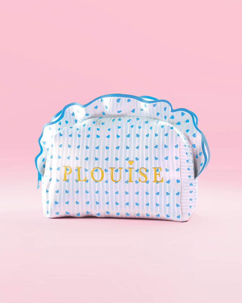 Blue and white striped P.Louise makeup and skincare bag with frills and a blue raspberry design