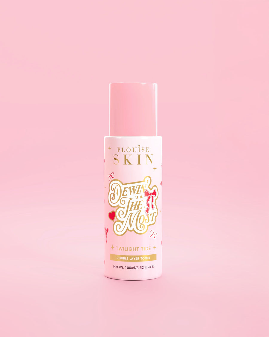 Pink P.Louise bottle of Dewing The Most Double Layer Toner with red bow designs against a pink background