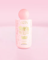Bouteille rose d'émulsion corporelle à l'huile lactée Layers Of Love de P.Louise au parfum de shortcake aux fraises