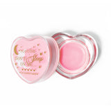 Masque de sommeil à lèvres en forme de coeur rose avec le couvercle retiré sur fond blanc