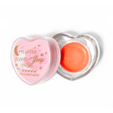 Masque de sommeil à lèvres en forme de coeur rose avec le couvercle retiré sur fond blanc
