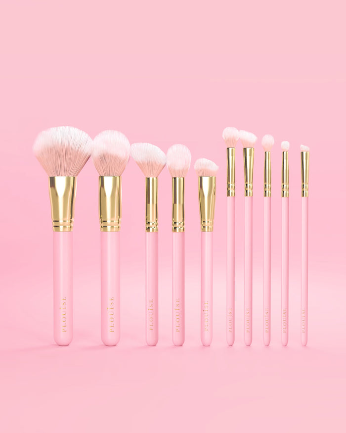 Lot de 10 pinceaux de maquillage P.Louise rose avec manches roses et accents dorés sur fond rose