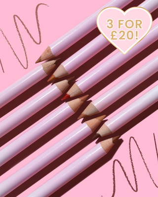Pink P.Louise sharpenable colour lip liner pencils laid in a row against a pink background
