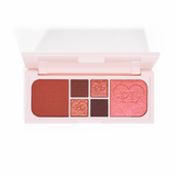 Une image de la mini palette yeux et visage Fluffy Fantasy de P.Louise, composée de mats crémeux et de reflets beurrés dans une gamme de nuances de rouge et de rose foncé.