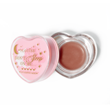 Masque de sommeil à lèvres en forme de coeur rose avec le couvercle retiré sur fond blanc